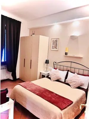 Letto o letti in una camera di Da Vice Rooms