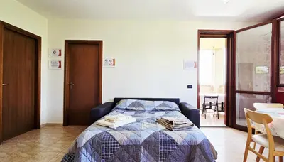 Letto o letti in una camera di Guest Holiday Alpi