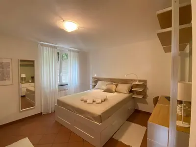 Letto o letti in una camera di La Casa nel Bosco - In collina a 10 minuti dal mare