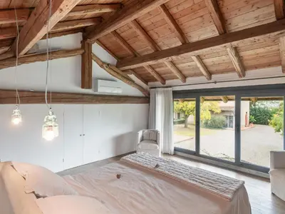 Letto o letti in una camera di Quaint Mansion in Stagno Lombardo with Garden