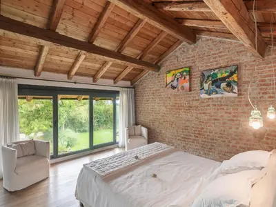 Letto o letti in una camera di Quaint Mansion in Stagno Lombardo with Garden