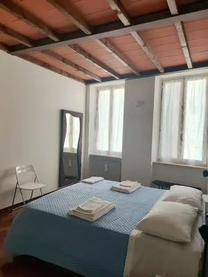 Letto o letti in una camera di A casa di Raffaella