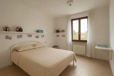 Letto o letti in una camera di Cinque Terre Escape - Casa Vacanze con Piscina