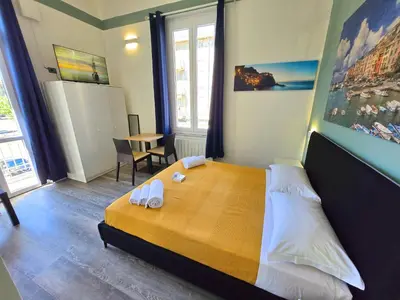 Letto o letti in una camera di Affittacamere Guest House Happy Holiday