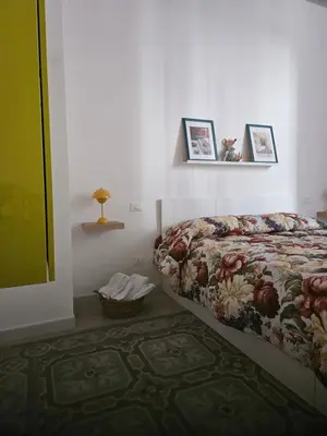 Letto o letti in una camera di Trinacria