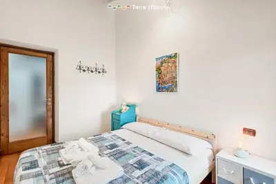 Letto o letti in una camera di Laya Marina, Terre Marine