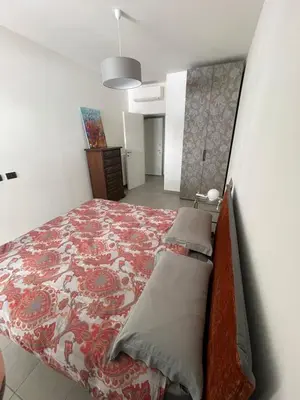 Letto o letti in una camera di Casa Vittoria - Chiavari