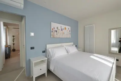 Letto o letti in una camera di CIVICO 8 Reggio Emilia