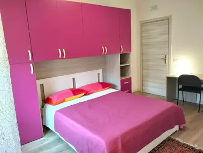 Letto o letti in una camera di Casa di Lucio