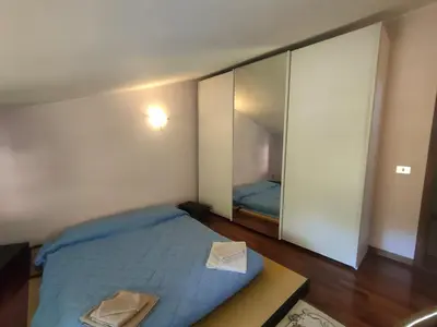 Letto o letti in una camera di B&B Acque chiare