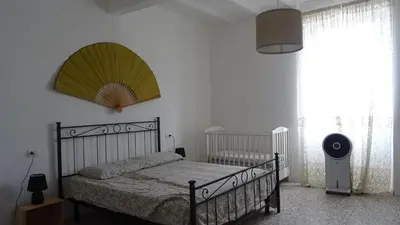 Letto o letti in una camera di Antica Acetaia