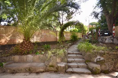 Giardino di Le sorelle - Elegante appartamento fronte mare - 6 posti letto - con posto auto privato