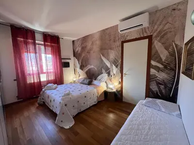 Letto o letti in una camera di Aurum 360 Attico Deluxe
