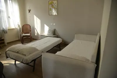 Letto o letti in una camera di Il Giardino di Eva - Holiday Home - intero alloggio