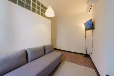 TV o dispositivi per l'intrattenimento presso the riviera attico terrazza