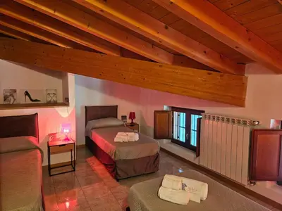 Letto o letti in una camera di Audrey