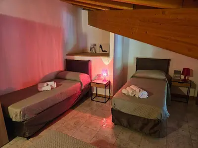 Letto o letti in una camera di Audrey