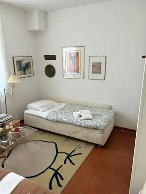 Letto o letti in una camera di RUBINO - piccolo nido vicino al mare