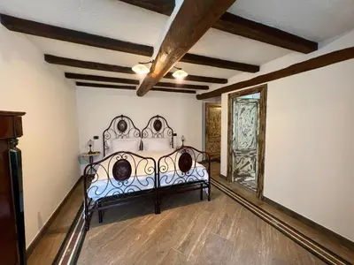 Letto o letti in una camera di Monte Cucco - Monticello Apartments