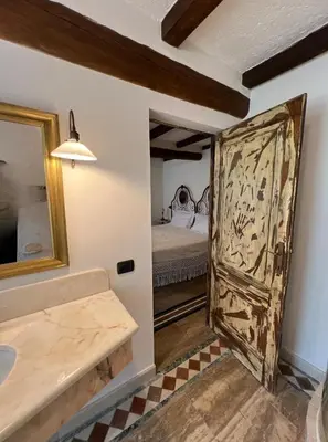 Letto o letti in una camera di Monte Cucco - Monticello Apartments