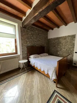 Letto o letti in una camera di Sant'Andrea - Monticello Apartments