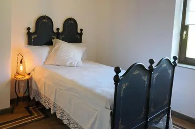 Letto o letti in una camera di Sant'Andrea - Monticello Apartments