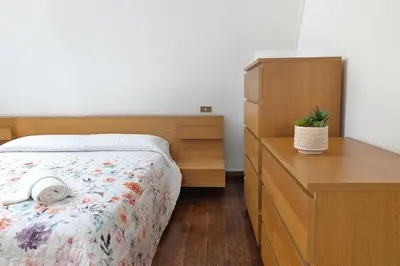 Letto o letti in una camera di Urbino Loft - City Center on foot