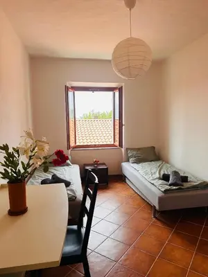 Letto o letti in una camera di Sole di Bagnone