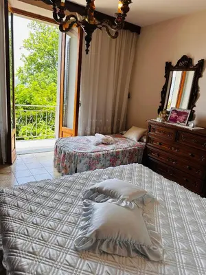 Letto o letti in una camera di Il Giardino di Monterole Cà d'Pini