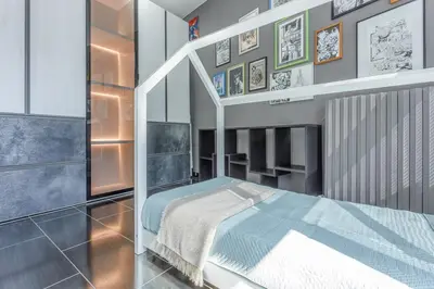 Letto o letti in una camera di Comics & Cars - Themed Penthouse in Motor Valley