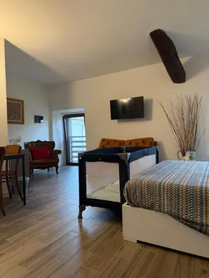 Letto o letti in una camera di Il Monastero di Qua