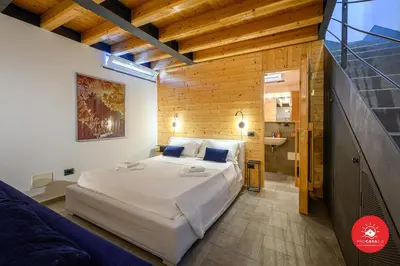 Letto o letti in una camera di S&D Antoniana 74