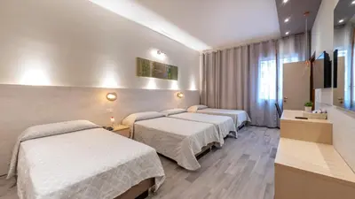 Letto o letti in una camera di Hotel San Marco