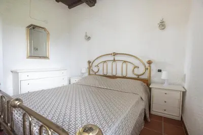 Letto o letti in una camera di 277B - Il Frantoio della Marchesa - Giardino e Piscina nel verde di Sestri Levante