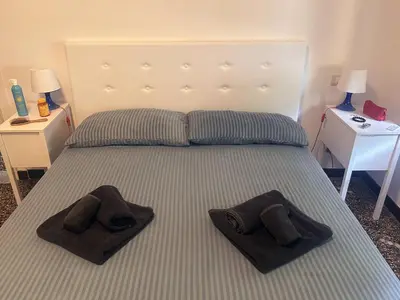 Letto o letti in una camera di Ca' Asseu