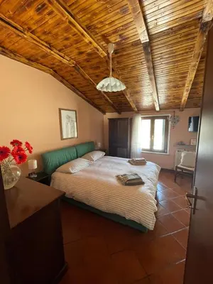 Letto o letti in una camera di Dimora La Casetta