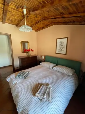Letto o letti in una camera di Dimora La Casetta
