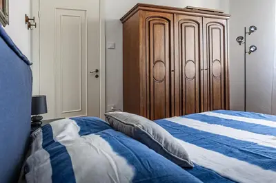 Letto o letti in una camera di Charme & Comfort, Maison di Stile, Sestri Levante