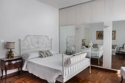Letto o letti in una camera di Charme & Comfort, Maison di Stile, Sestri Levante
