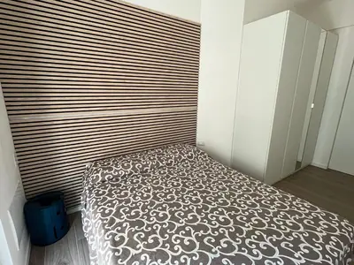 Letto o letti in una camera di Nuvola apartment