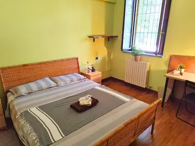 Letto o letti in una camera di Karma House