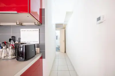 Cucina o angolo cottura di GuestHost - Bright and Central Apartment in Parma