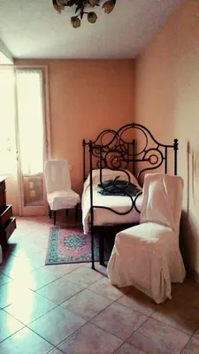 Letto o letti in una camera di B&B La Bugia di Villa Tanzi