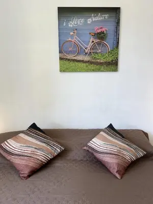 Letto o letti in una camera di Anne-Britt Home