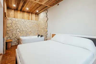Letto o letti in una camera di Resort Ombreseda