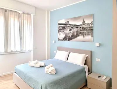 Letto o letti in una camera di Italian Experience-Vittoria Suite