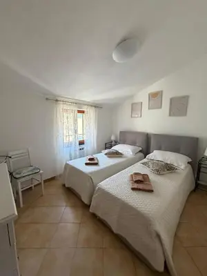 Letto o letti in una camera di CA'da LU'