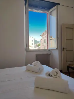 Letto o letti in una camera di Casa Matteotti By Vacanze in Chiavari