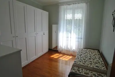 Letto o letti in una camera di Casa Anna