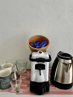 Set per la preparazione di tè e caffè presso Camera in Villa